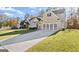 Lovely two-story home with brick and siding exterior, front porch, and long driveway at 1511 Arica Ave, Lawrenceville, GA 30043