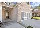 Attached two car garage door on an inviting two story home with brick accents at 1511 Arica Ave, Lawrenceville, GA 30043