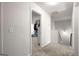 Upstairs hallway looking into a closet with visible storage at 1511 Arica Ave, Lawrenceville, GA 30043