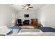 Living room with fireplace, television, and spacious seating arrangement at 1511 Arica Ave, Lawrenceville, GA 30043