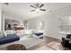 Open-concept living room features hardwood floors and a comfortable sectional sofa at 1511 Arica Ave, Lawrenceville, GA 30043