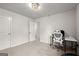 Bright office with chair and desk and views into another room at 1511 Arica Ave, Lawrenceville, GA 30043