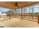Outdoor back porch features wood panel ceiling and a beautiful view of the outdoors at 130 Windchime Way # 9, Tyrone, GA 30290