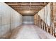 Unfinished basement shows brick walls and concrete floor at 130 Windchime Way # 9, Tyrone, GA 30290
