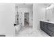 Modern bathroom featuring a glass-enclosed shower and a vanity with gray cabinets at 130 Windchime Way # 9, Tyrone, GA 30290