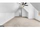Spacious bedroom featuring a ceiling fan, neutral carpeting, and windows at 130 Windchime Way # 9, Tyrone, GA 30290