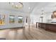 Spacious living room boasts hardwood floors, ample natural light, and open concept layout at 130 Windchime Way # 9, Tyrone, GA 30290
