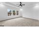 Spacious main bedroom features natural light from the large windows overlooking the lake at 130 Windchime Way # 9, Tyrone, GA 30290