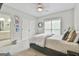 Cozy bedroom with neutral tones, plush carpet, and a window offering natural light and closet for storage at 3435 Vista Creek Dr, Dacula, GA 30019