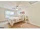 Finished basement bedroom area with light walls, natural light, and wood-look laminate flooring at 3435 Vista Creek Dr, Dacula, GA 30019