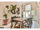 Elegant dining room with tall ceilings, modern chandelier, and stylish decor at 3435 Vista Creek Dr, Dacula, GA 30019