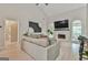 Comfortable living room with high ceilings, cozy fireplace, and natural light at 3435 Vista Creek Dr, Dacula, GA 30019