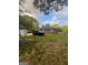 Expansive backyard offers space for entertaining, with a grassy lawn and mature trees at 4111 Scott Dr, Forest Park, GA 30297