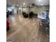 Spacious living room with modern flooring, neutral paint, and a ceiling fan at 4111 Scott Dr, Forest Park, GA 30297