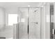 Modern bathroom with soaking tub and glass-enclosed shower at 1809 Quaker, Hampton, GA 30228