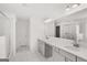 Modern bathroom with dual vanity sinks and glass shower at 1809 Quaker, Hampton, GA 30228