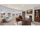 Office featuring a fireplace, built-in shelves, a desk, and natural lighting at 1809 Quaker, Hampton, GA 30228