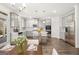 Spacious eat-in kitchen with stainless steel appliances, gray cabinets, and hardwood floors at 1809 Quaker, Hampton, GA 30228