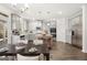 Modern kitchen with gray cabinets, stainless steel appliances, and a large island with barstool seating at 1809 Quaker, Hampton, GA 30228