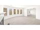 Bright living room with large windows and decorative fireplace at 1809 Quaker, Hampton, GA 30228