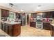 Kitchen with stainless steel appliances and breakfast bar at 275 Brandon Mill Cir, Fayetteville, GA 30214