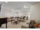 Spacious finished basement featuring neutral walls, carpet, recessed lighting, and a comfortable seating area at 240 Longmead Dr, Fayetteville, GA 30215