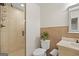 Bathroom with a toilet, sink with vanity, and tile stand-up shower at 240 Longmead Dr, Fayetteville, GA 30215