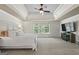 Spacious bedroom featuring tray ceilings, plush carpet, and ample natural light at 240 Longmead Dr, Fayetteville, GA 30215