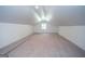 Finished attic space with new carpet, skylights, and ample potential for a flexible living area at 101 Bluegill Trce, Peachtree City, GA 30269