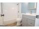 Bright bathroom with a combined tub and shower, a modern vanity, and stylish fixtures at 101 Bluegill Trce, Peachtree City, GA 30269