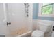 Clean bathroom with a tiled shower and updated fixtures, adjacent to a toilet at 101 Bluegill Trce, Peachtree City, GA 30269