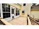 Exterior shot of the deck with stairs leading to the ground and a door with dog door at 101 Bluegill Trce, Peachtree City, GA 30269