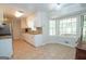 Bright kitchen features granite countertops and tile backsplash in eating area at 101 Bluegill Trce, Peachtree City, GA 30269