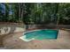 Refreshing in-ground pool with a concrete deck, ready for summer fun and relaxation at 101 Bluegill Trce, Peachtree City, GA 30269