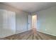 Bedroom features a closet and neutral carpeting at 313 Country Club Dr, Jonesboro, GA 30238