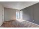 Spacious bedroom filled with natural light, carpeted floors, and ample closet space at 313 Country Club Dr, Jonesboro, GA 30238