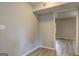 Neutral-toned hallway with updated floors, leading to other rooms in the home at 313 Country Club Dr, Jonesboro, GA 30238