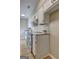 Kitchen with white cabinets, stainless steel appliances, granite counters, and modern backsplash at 313 Country Club Dr, Jonesboro, GA 30238