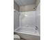 White tile shower tub with new fixtures at 313 Country Club Dr, Jonesboro, GA 30238
