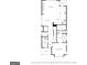First floor plan featuring a spacious kitchen, living room, dining area, and primary bedroom with balcony at 405 Bandon Way, Peachtree City, GA 30269