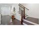 Elegant entryway featuring a staircase, wooden floors and tasteful décor, adding charm and sophistication at 405 Bandon Way, Peachtree City, GA 30269