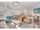 Spacious open floor plan showcases the living room and kitchen with abundant natural light at 405 Bandon Way, Peachtree City, GA 30269