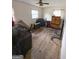 Bedroom with natural light, ceiling fan, and vintage furnishings offering a cozy, inviting atmosphere at 5637 Sturbridge Way, South Fulton, GA 30349