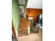 Stairway showcasing an opportunity to revamp its classic wooden stairs at 5637 Sturbridge Way, South Fulton, GA 30349