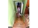 Wooden staircase leading to the upper level, providing access to more space at 5637 Sturbridge Way, South Fulton, GA 30349
