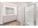 Elegant bathroom with double vanity, ample counter space, and a modern glass shower at 8504 Polston Pl # 145, Douglasville, GA 30134