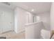 Bright hallway with neutral carpet, white walls and doors for a clean, modern look at 8504 Polston Pl # 145, Douglasville, GA 30134