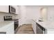 Bright and spacious kitchen featuring granite countertops, stainless steel appliances, and a large island at 8501 Polston Pl # 143, Douglasville, GA 30134
