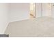 Spacious bedroom with neutral carpet and access to ensuite bath and walk-in closet at 8502 Polston Place # 144, Douglasville, GA 30134