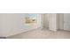 This bedroom features neutral carpet, white walls, baseboards and trim, plus a closet at 1949 Van Allen Ct # 4, Dacula, GA 30019